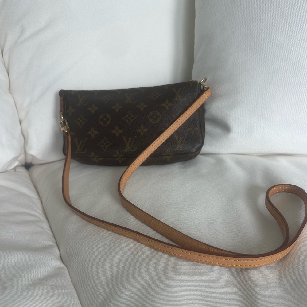 Louis Vuitton Crossbody bag. Barley used and in great condition.